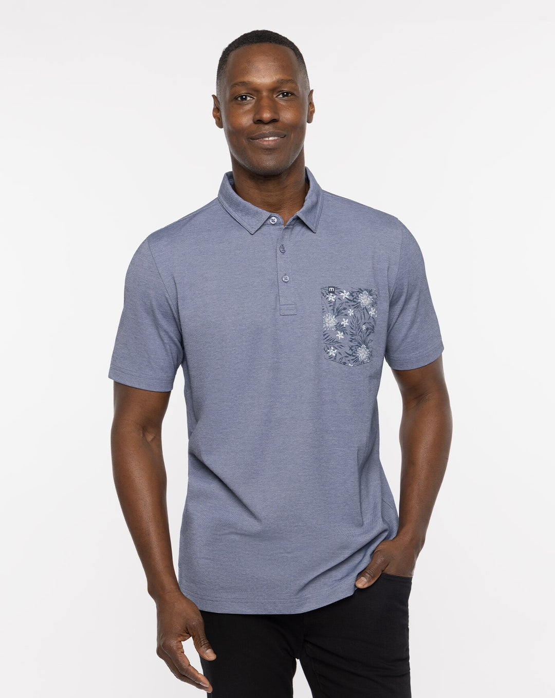 TRAVISMATHEW MENS NO MAPS POLO - HEATHER PEACOAT