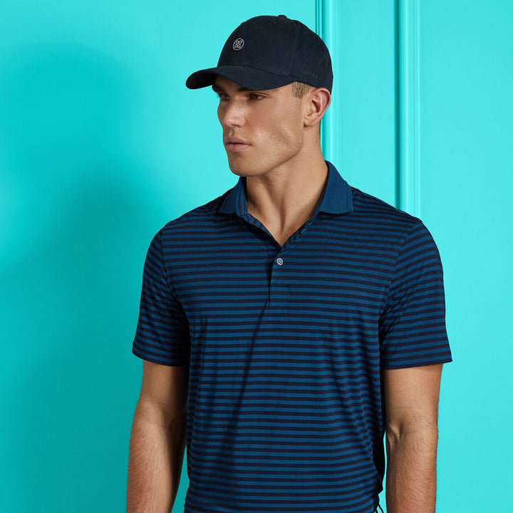 G/FORE MENS PERFORATED STRIPE TECH JERSEY POLO - TWILIGHT